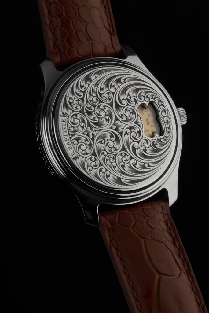 Détail de la gravure artisanale à l'échoppe sur la montre Léopold.